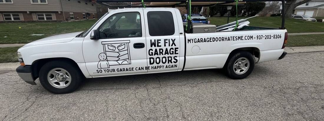 We Fix Garage Doors truck — so your garage can be happy again, mygaragedoorhatesme.com, (937) 203-8306